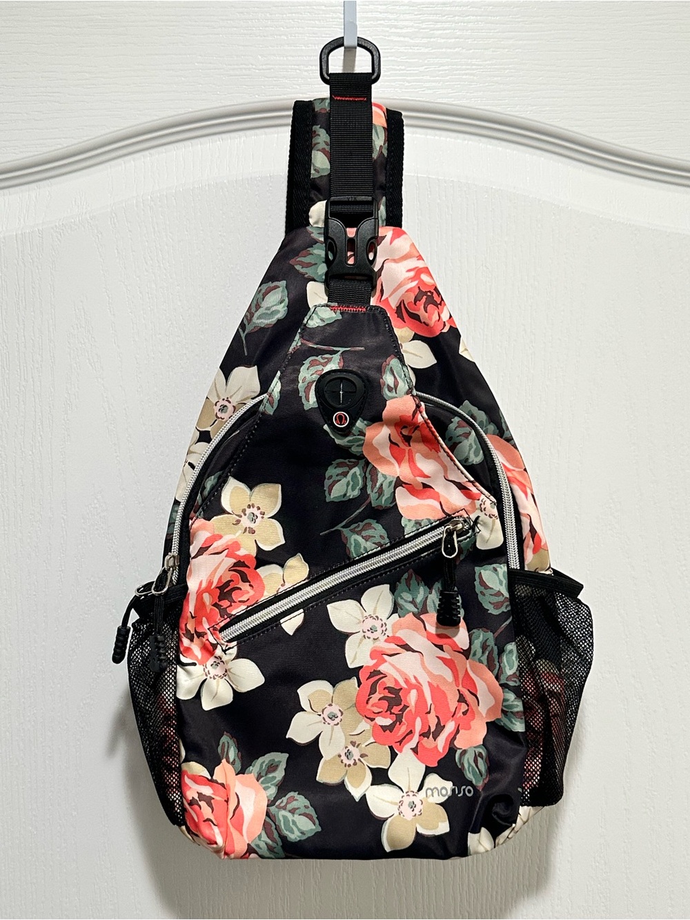 MOSISO Sling Backpack with a black base and Floral Pattern - NWOT